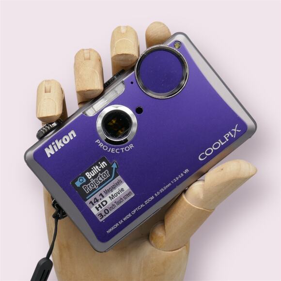 Nikon Coolpix S1100pj Digital Camera | 14.1MP | Purple - Picture 1 of 6